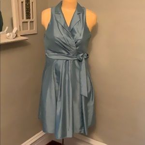 Cute belted dress. Fully lined